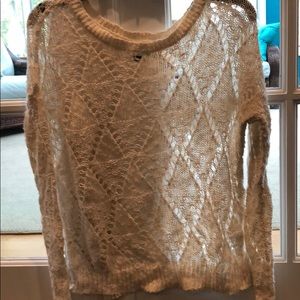 white sweater with holes